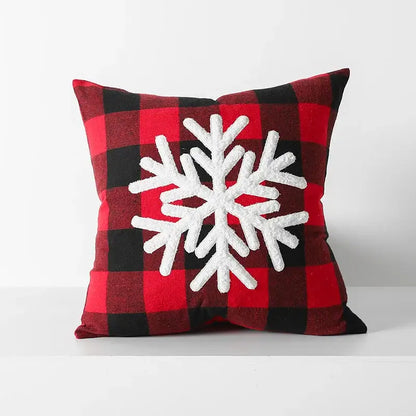 Red and black plaid cushion cover with white textured snowflake appliqué from decorbites christmas plaid collection