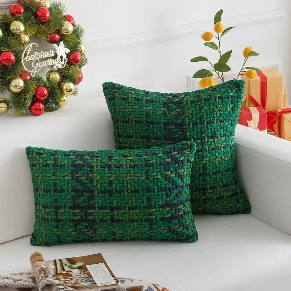Two rectangular green herringbone knit throw pillows with woven fabric featuring decorbites christmas plaid weave cushion cover
