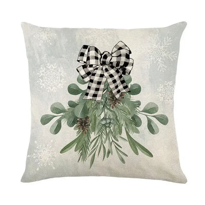 Decorbites christmas snow elk pillow cover with light gray fabric, green foliage embroidery, pinecones, and checkered bow