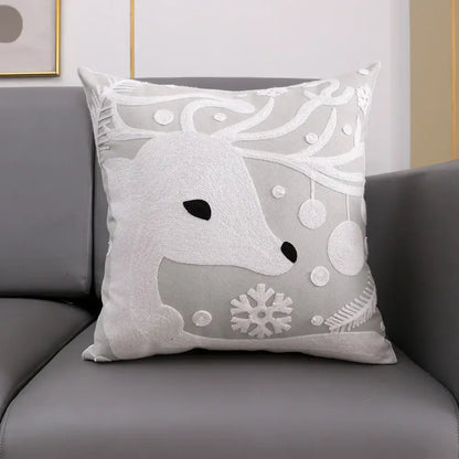 Soft gray cushion cover with white embroidered snowflake deer and festive ornaments by decorbites christmas snowflake