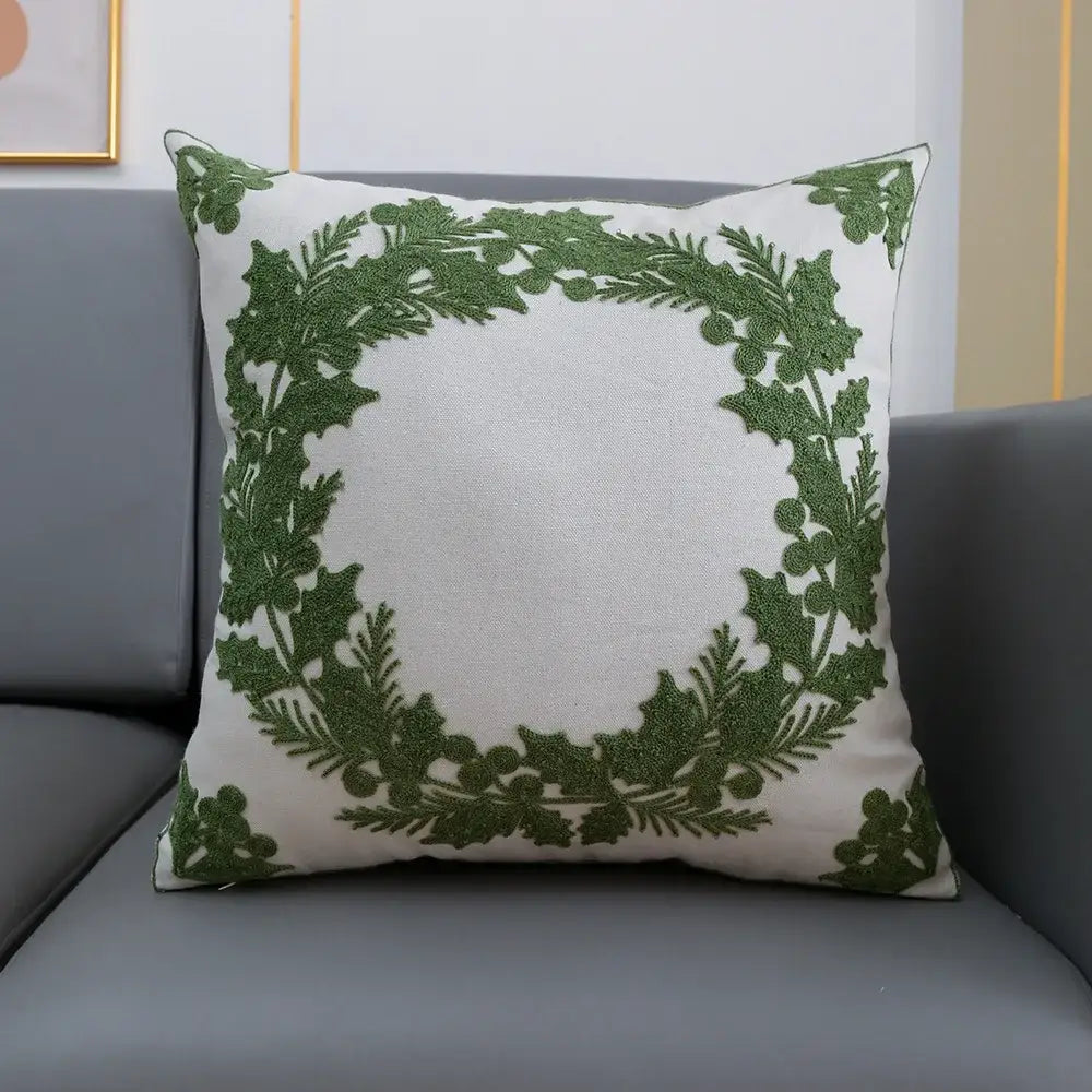 White cushion cover with embroidered green holly wreath for decorbites christmas snowflake deer collection