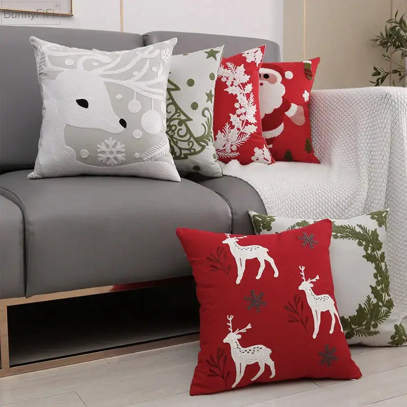 Red cushion cover featuring white snowflake deer embroidery from decorbites christmas snowflake collection