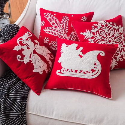 Red velvet christmas throw pillows with white embroidered holiday designs from decorbites christmas snowflake elk collection