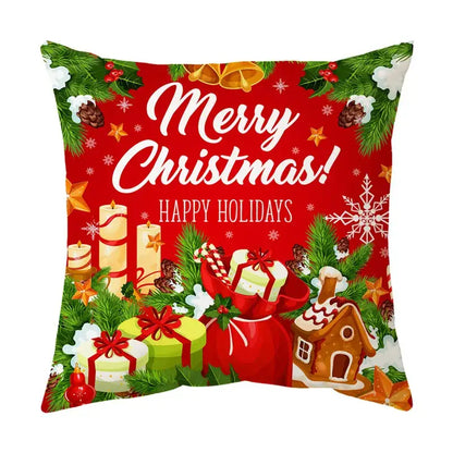 Red christmas-themed decorbites christmas sofa pillow cover featuring festive gifts gingerbread house and merry christmas text