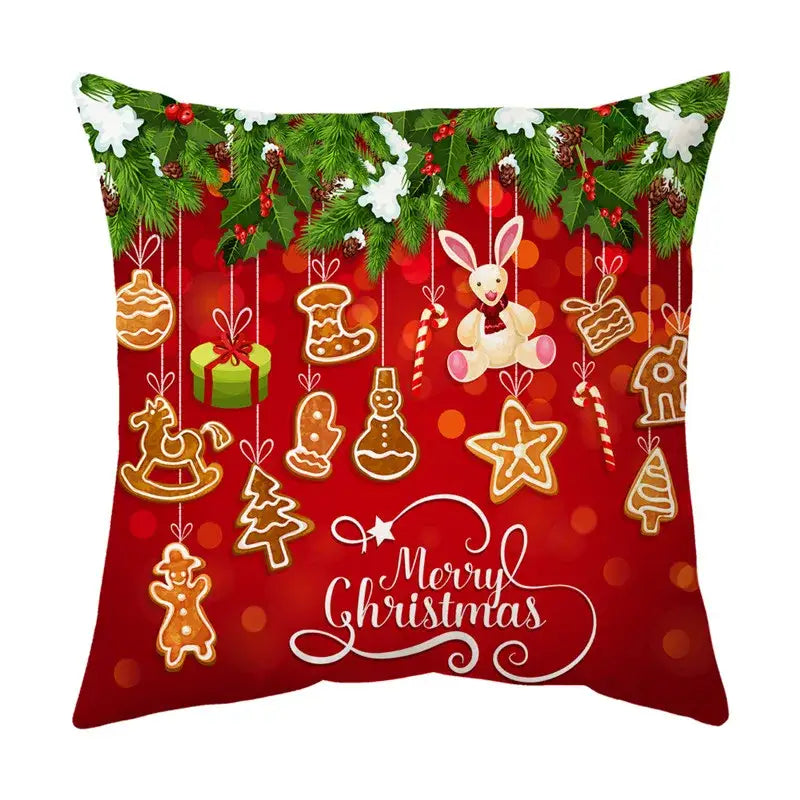 Red decorbites christmas sofa pillow cover featuring festive gingerbread cookies, plush bunny, and merry christmas script