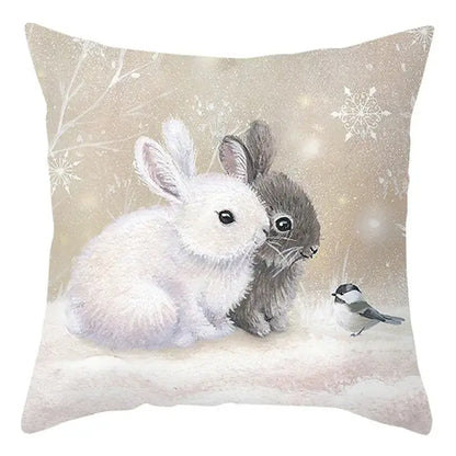 Beige decorbites christmas soft plush cushion cover featuring rabbits and bird illustration in snowy winter scene