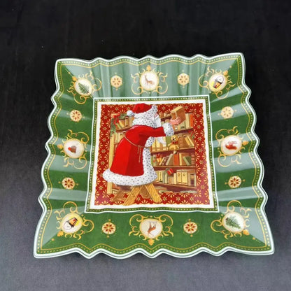 Green ceramic serving platter with scalloped edges featuring santa claus illustration for decorbites christmas tableware