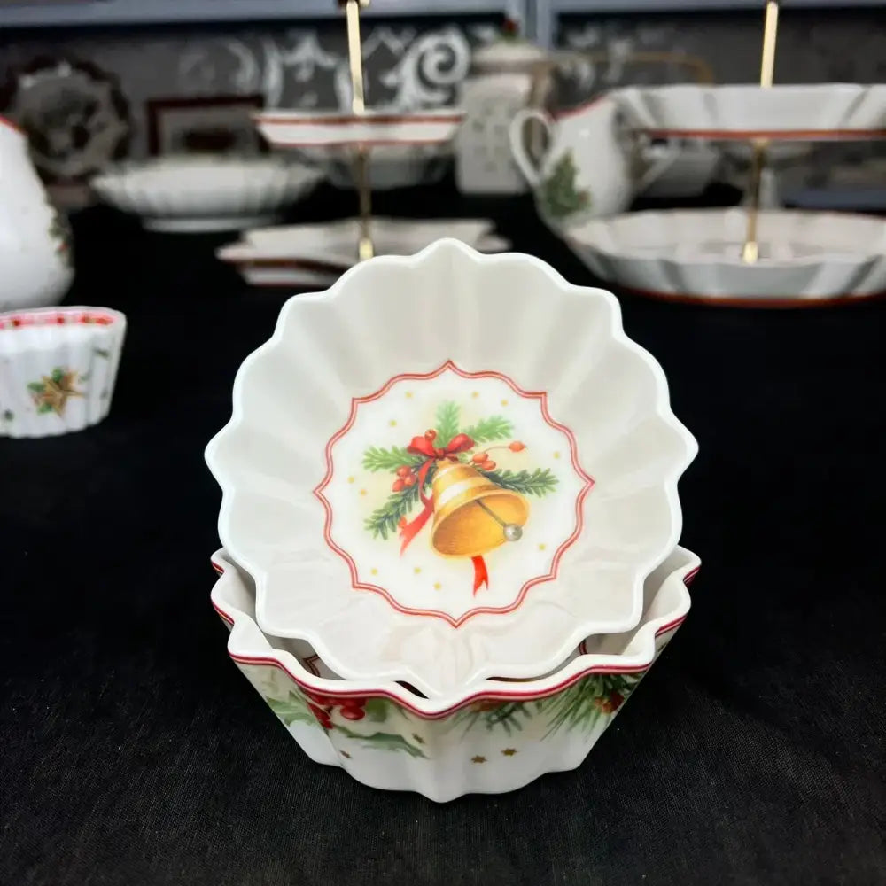 White ceramic ramekin with scalloped edges and festive red and green bell design from decorbites christmas tableware