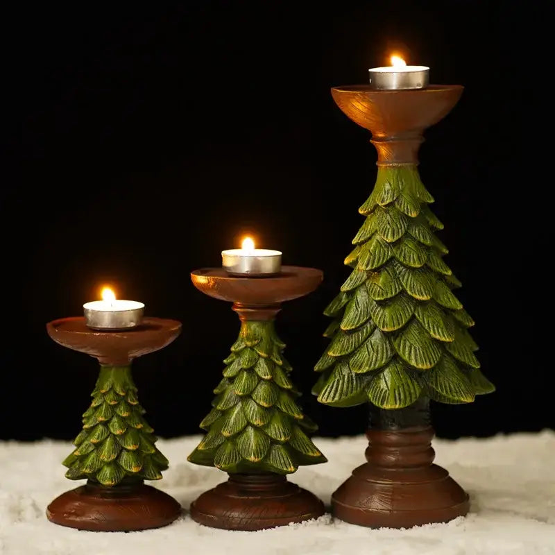 Decorbites™ christmas tree candle holder features three tiered green and brown resin christmas tree candles with lit tea lights