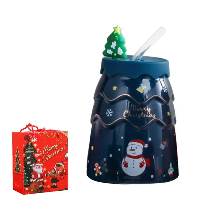 Dark blue DecorBites christmas tree ceramic mug with snowman design gold foil accents and green tree ceramic lid topper