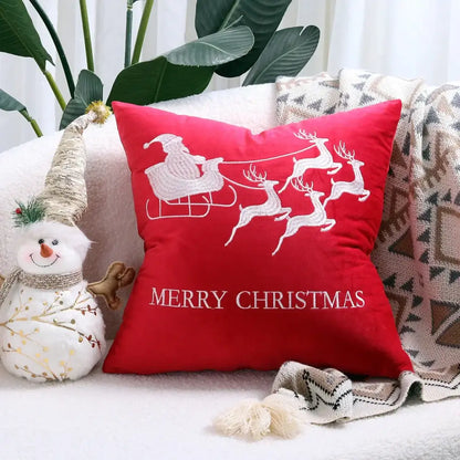 Red christmas pillow cover with white embroidered santa sleigh and merry christmas text for festive cushion cover decor