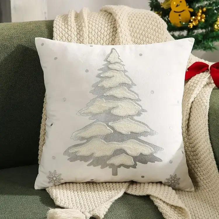 White DecorBites™ cushion cover with embroidered gray christmas tree and silver snowflake accents for festive decor