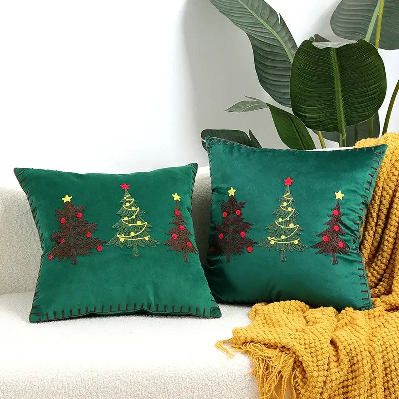Emerald green velvet decorbites christmas tree cushion covers with embroidered christmas trees red ornaments and yellow stars
