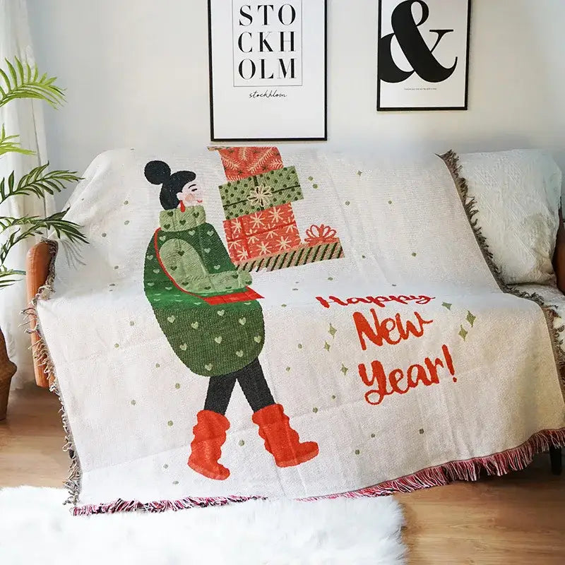 Cozy off-white decorbites christmas tree knitted throw blanket with festive woman carrying gifts and happy new year embroidery