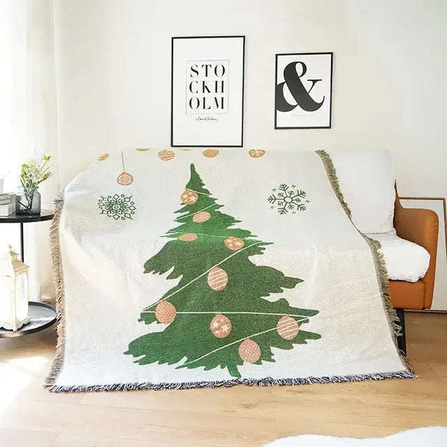 White decorbites christmas tree knitted throw blanket with green tree gold ornaments snowflakes and fringed edges
