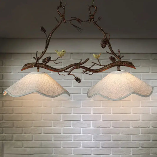 DecorBites™ classic 2-head resin branch suspension light with beige scalloped fabric shades and yellow bird figurines in brown