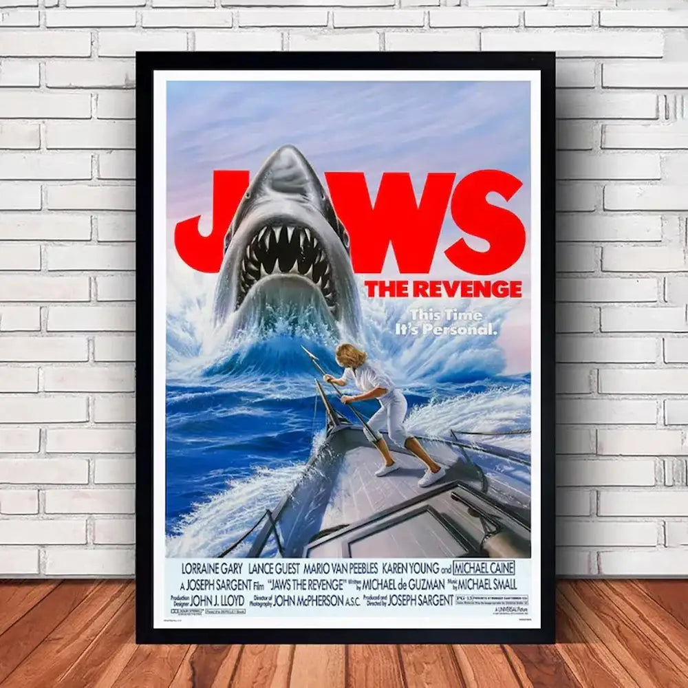 Black-framed DecorBites™ classic jaws movie poster canvas featuring menacing shark and person on boat