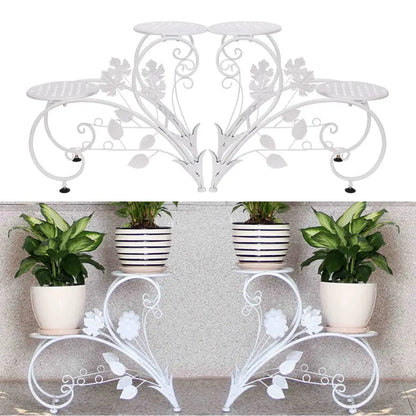White wrought iron classic tall plant stand with floral leaf design and three tiered shelves for indoor outdoor use