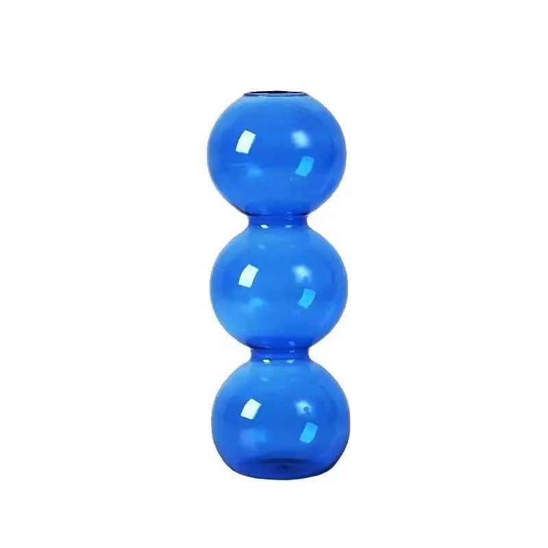 Vibrant cobalt blue glass bubble vase with three stacked spheres for stylish home decor by DecorBites™