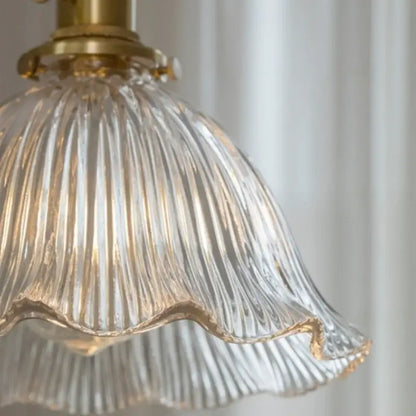 Clear glass led pendant light with ribbed design and brass fixture from decorbites for bedroom lighting