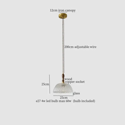 A delicate 25cm frosted clear glass led pendant light with wooden copper socket by decorbites for bedroom use