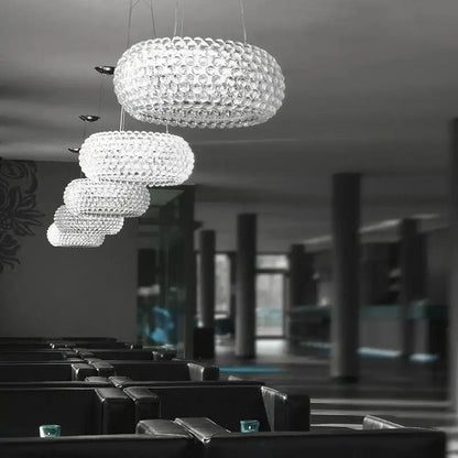 Clear bubble-like crystal pendant lights with a modern tiered design in decorbites clear gold acrylic for living room chandelier