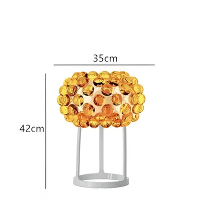 Golden amber glass orb lamp with sleek silver base in decorbites clear gold acrylic pendant lights chandelier