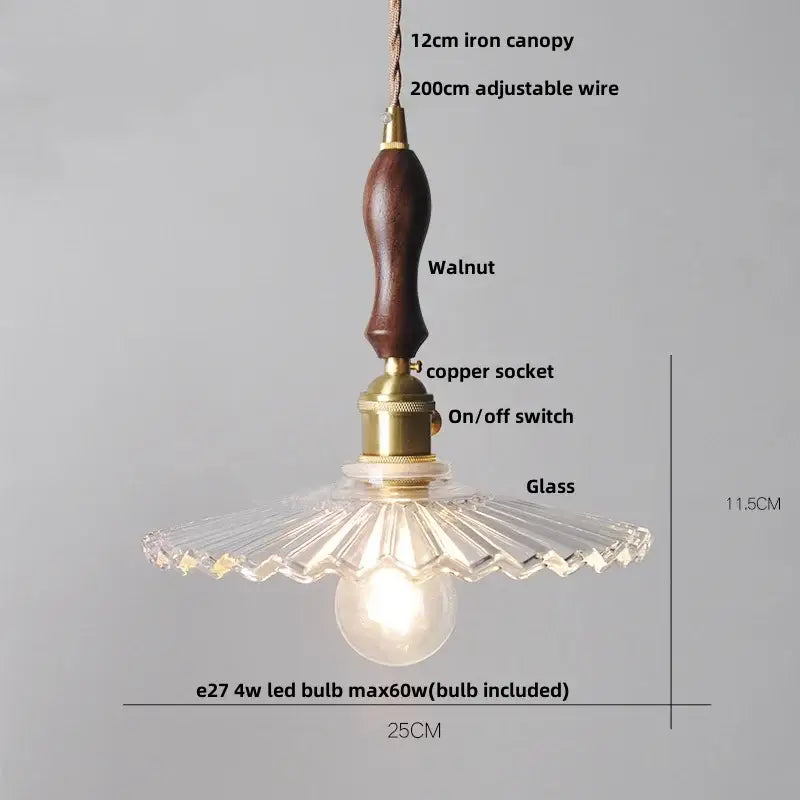 Decorbites clear leaf pendant light with dark walnut handle brass accents and clear fluted glass shade for dining room