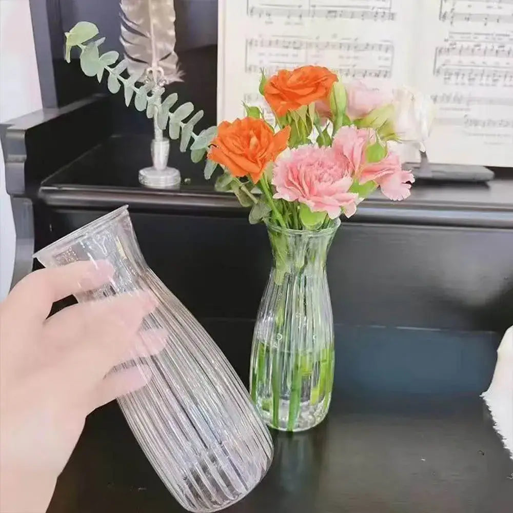 Clear glass plastic vase with vertical ribbed texture and slender neck for hydroponic flowers by DecorBites clear nordic style