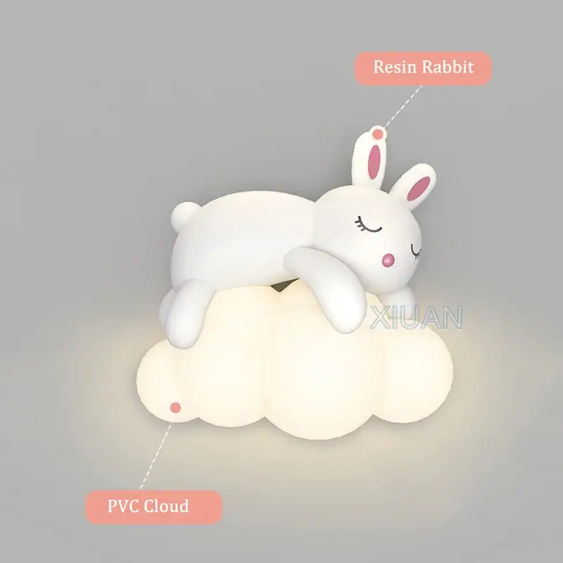Cute white resin rabbit perched on glowing pvc cloud in decorbites cloud bunny lamp for bedroom wall light