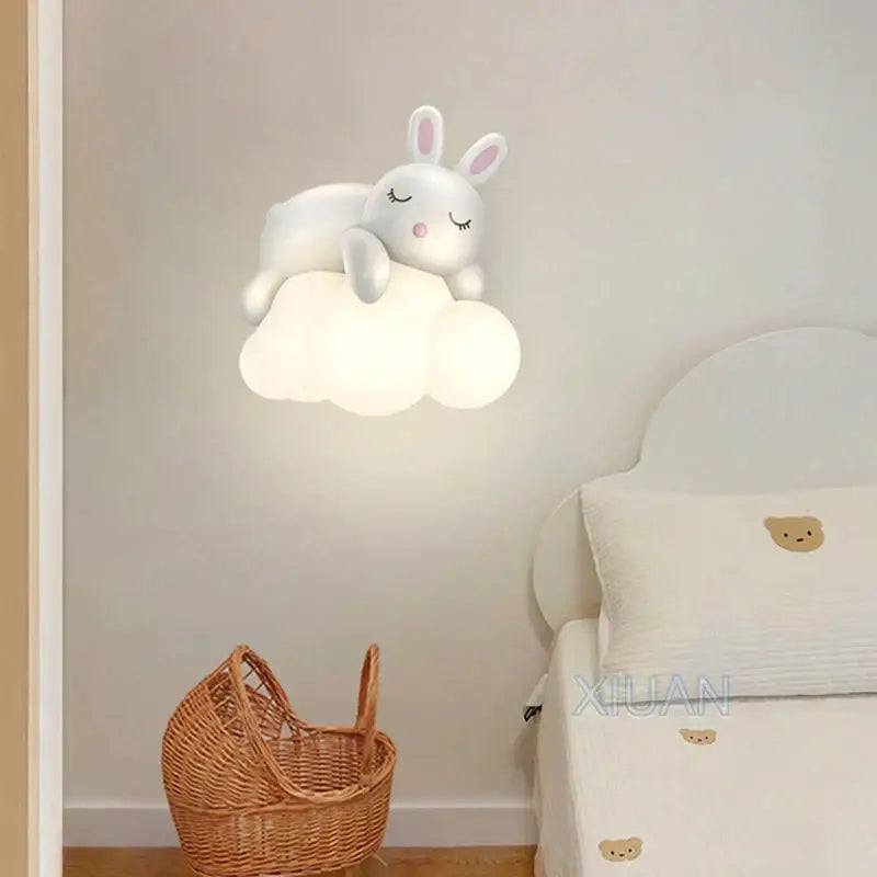 Decorbites cloud bunny white rabbit wall lamp shaped like a cute bunny with closed eyes and pink nose perched on a cloud