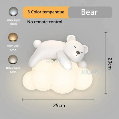 A soft white plush bear-shaped led night light with three color settings on a cloud base from decorbites cloud bunny lamp