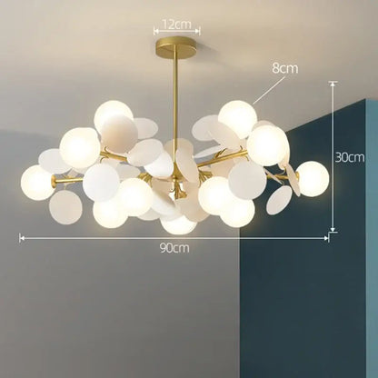 Gold-toned colorful led branch chandelier with frosted glass globe shades for living room and bedroom decor
