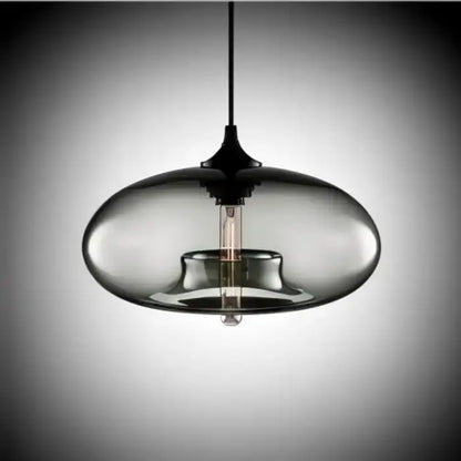 A sleek dark smoked glass pendant light with exposed filament bulb in decorbites colorful led pendant lights collection