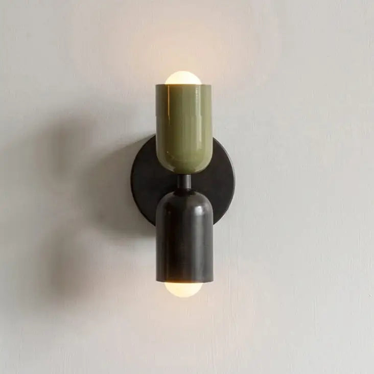 Olive-green and black ceramic wall sconce with minimalist modern design and glass shade by DecorBites™