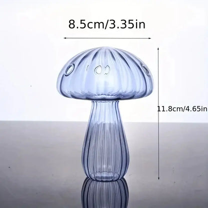 DecorBites™ colorful mushroom vase made of translucent blue glass with vertical ridges and three circular cutouts