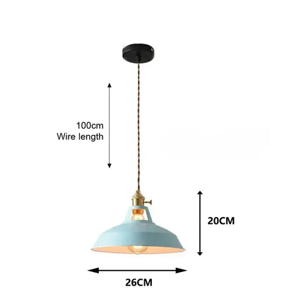 A vintage-style pendant light with a pale blue dome shade and brass accents from DecorBites colorful retro pendant lights