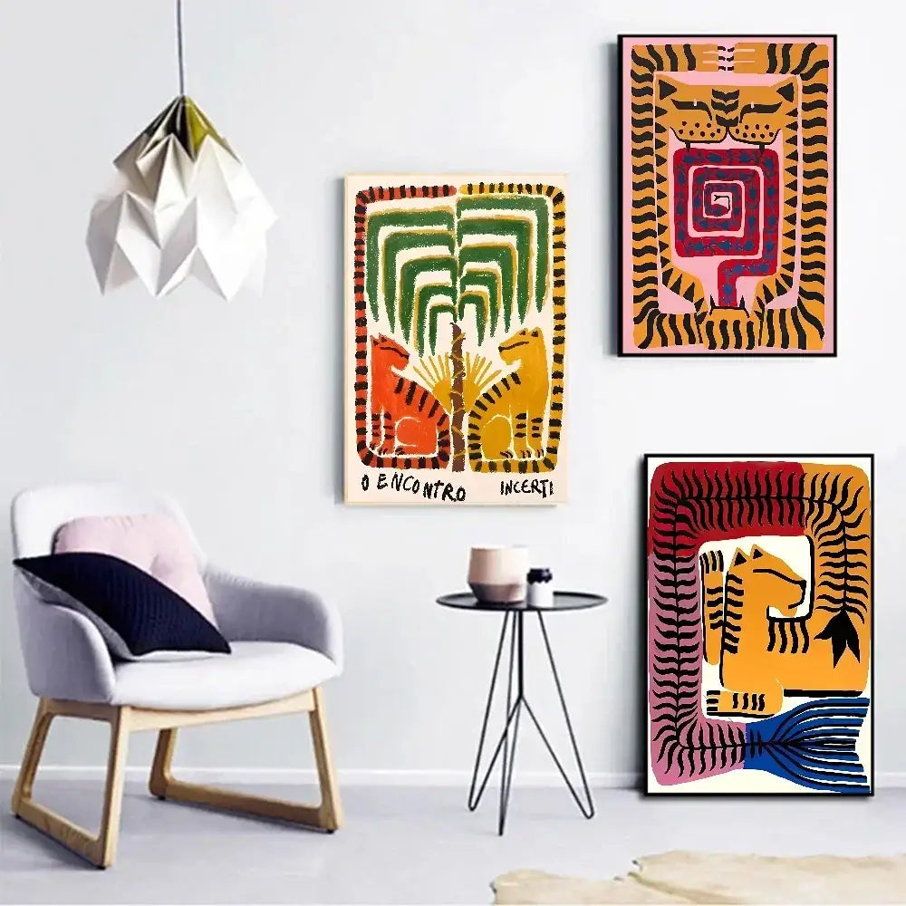 Three vibrant geometrically stylized tiger and leopard vintage poster wall art pieces in bold colors by DecorBites™