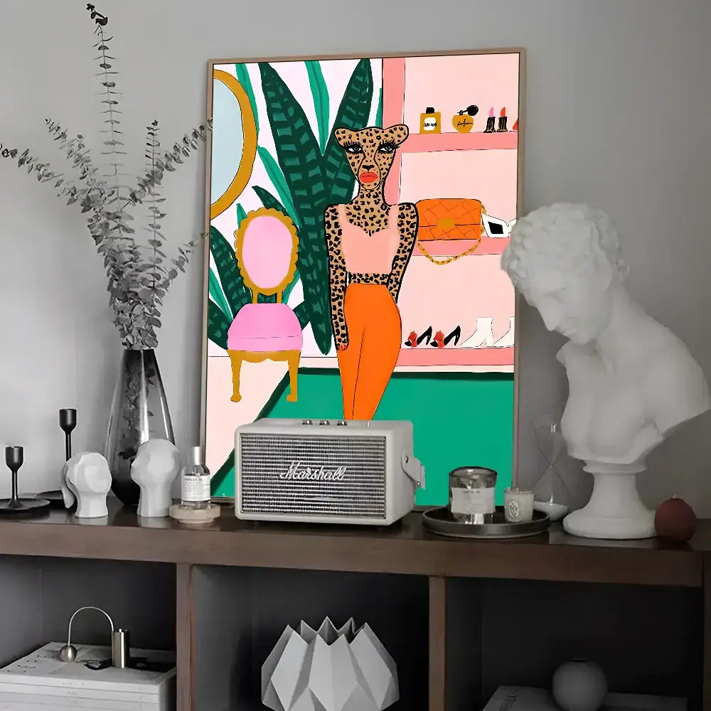 A vibrant leopard vintage poster wall art featuring a woman in orange pants and pink top beside a pink chair and foliage