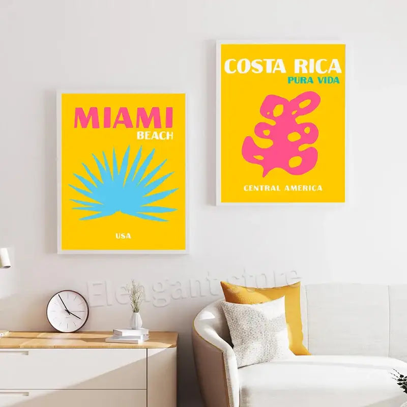 Two framed vibrant yellow retro travel posters art print set featuring miami beach and costa rica pura vida designs