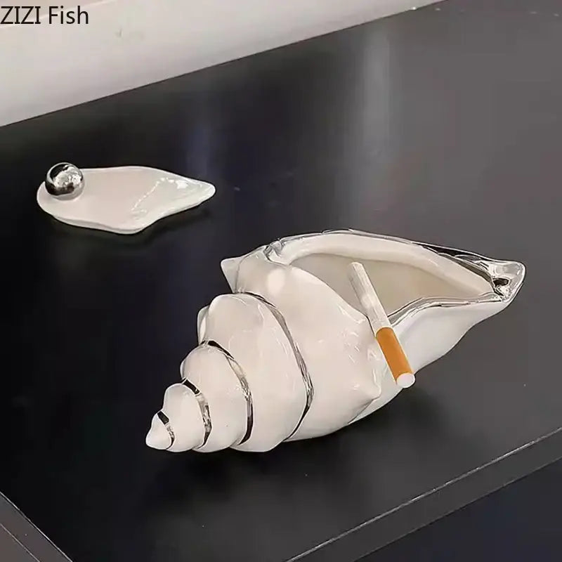 White ceramic conch ashtray with silver metallic accents and matching lid by Decorbites for living room decor