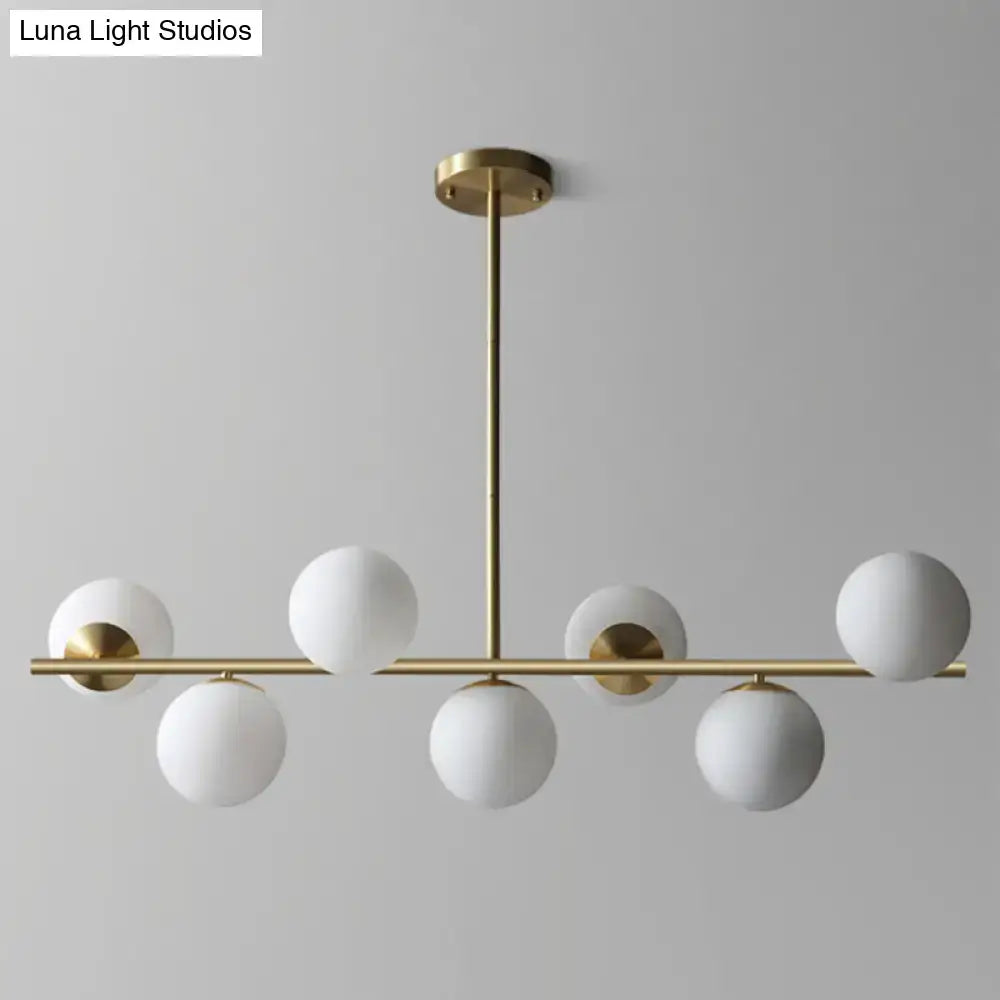 Modern brass pendant lamp with six frosted white glass globe shades ideal for living room sphere island lighting 220v-240v