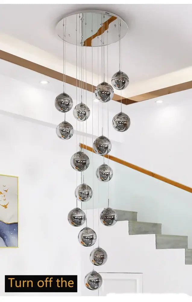 Modern chrome-finished DecorBites™ contemporary crystal ball chandelier with circular ceiling mount for dining room use