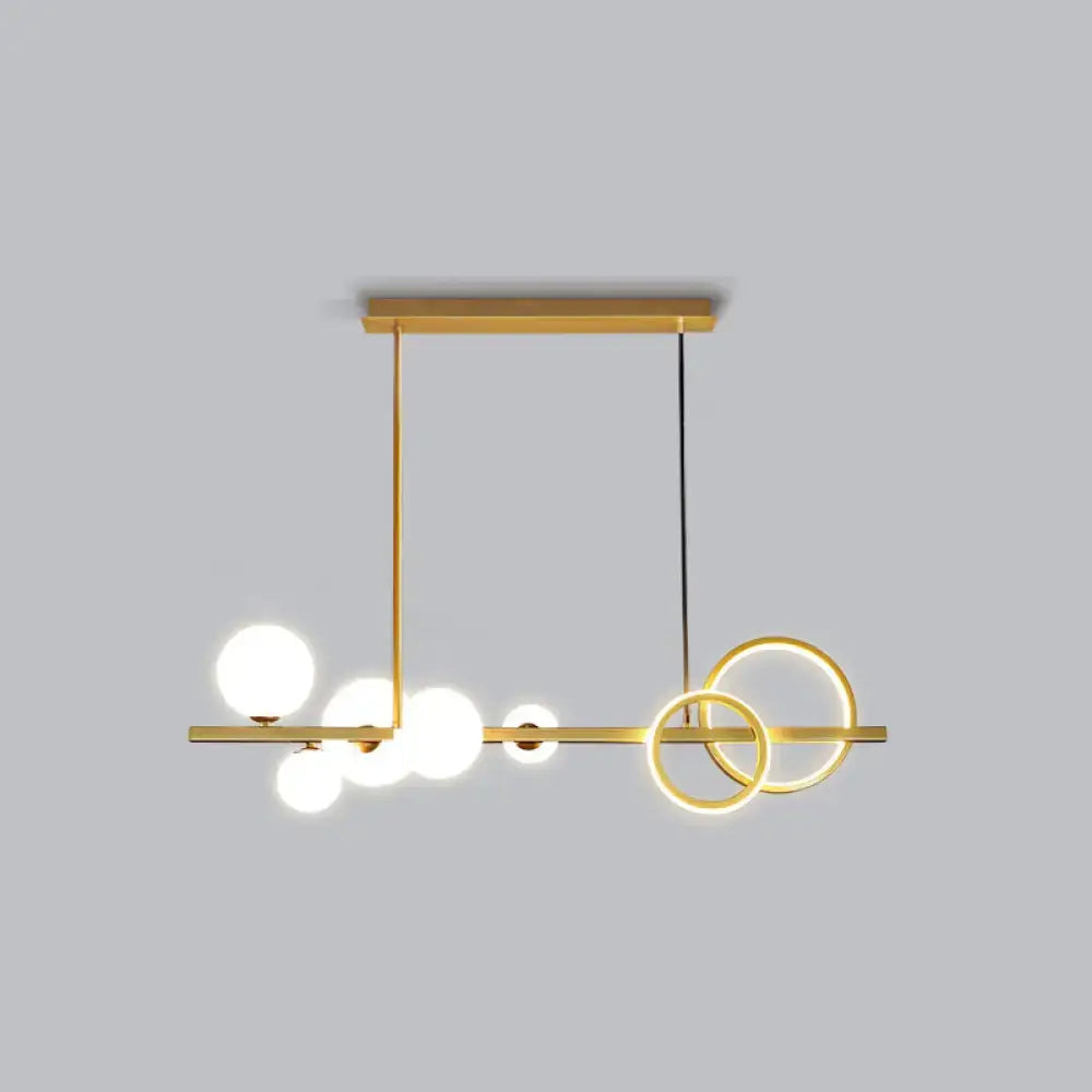DecorBites contemporary island lamp with gold tone, milk white spherical bulbs and smoke grey circular rings for dining room