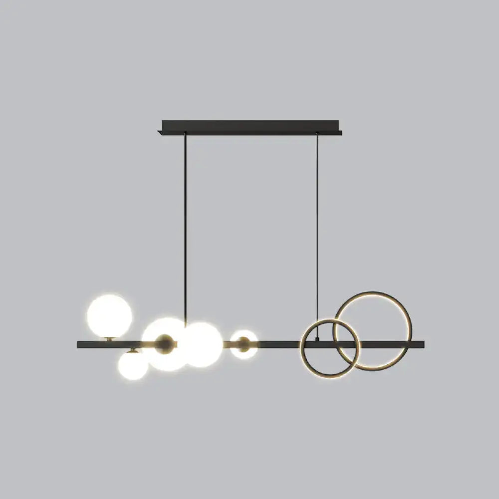DecorBites™ contemporary 7-head island lamp with black brass rings and smoke grey spherical glass bulbs for dining room