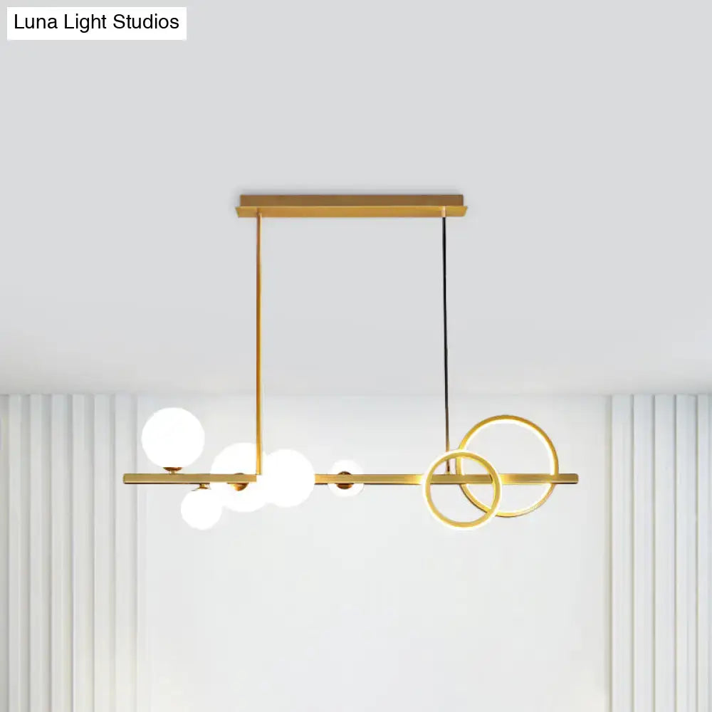 Decorbites™ contemporary 7-head island lamp with gold-toned rings and milk white and smoke grey glass bulbs for dining room