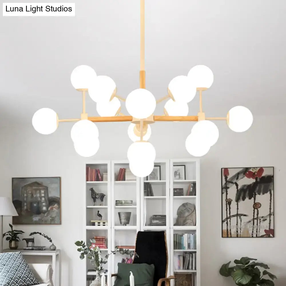 Modern chandelier with light wood frame and white glass globe bulbs for dining room hanging light decorbites
