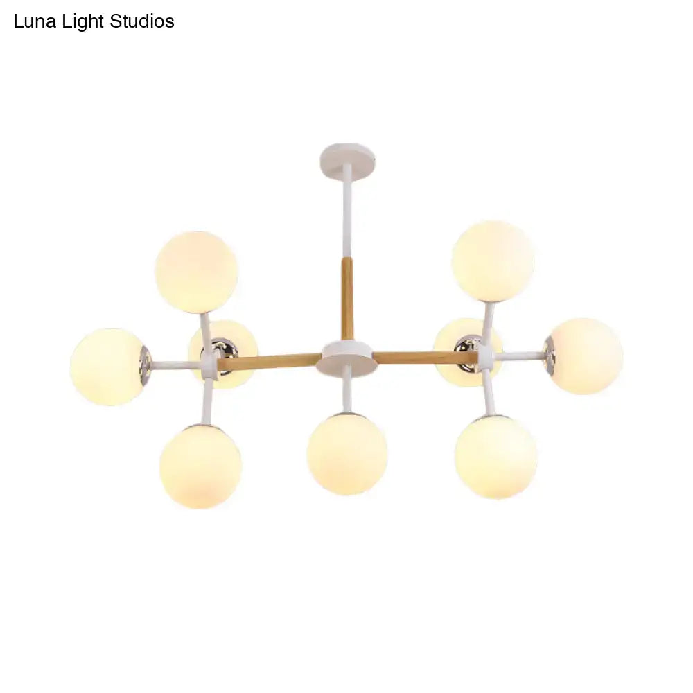 DecorBites contemporary globe chandelier with white glass globes and wooden crossbar for dining room hanging light