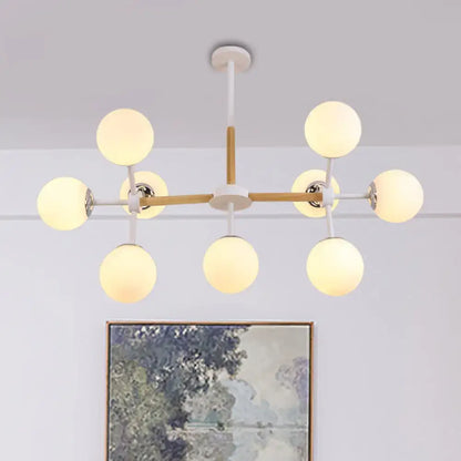 Decorbites contemporary globe chandelier with white glass globes and wooden rod dining room hanging light kit