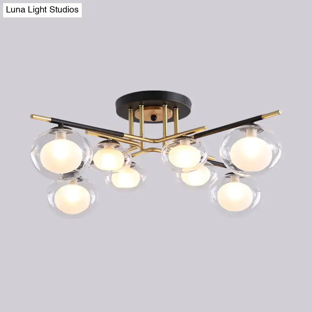 Decorbites™ contemporary semi-flush mount ceiling fixture with black and brass metal frame and oval glass shade
